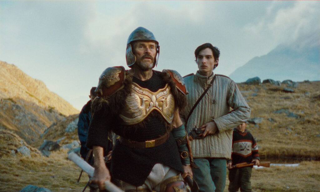 Two man, one is dressed as Roman soldier, scene from a film. Photo/image: ‘The Legend of Ochi’ courtesy of A24