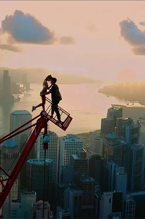 Man and a woman standing on a crain high in the sky. Photo/image: ‘The Skywalkers: A Love Story’ courtesy of XYZ Films