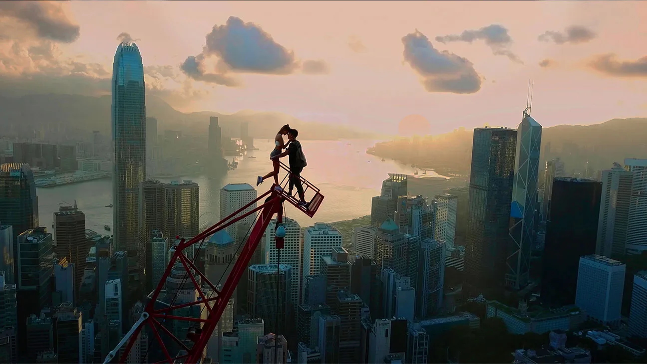 Man and a woman standing on a crain high in the sky. Photo/image: ‘The Skywalkers: A Love Story’ courtesy of XYZ Films
