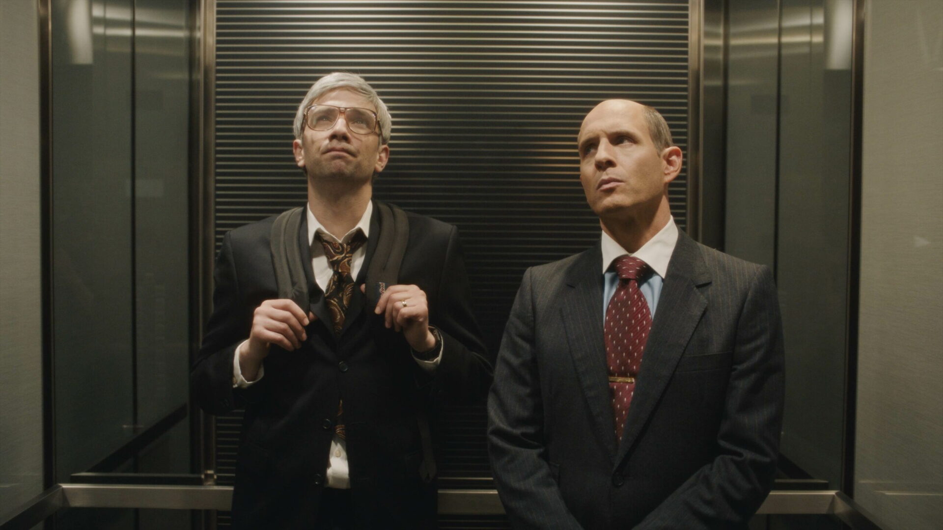 2 men in elevator. Photo/image: ‘Blackberry’ courtesy of XYZ Films