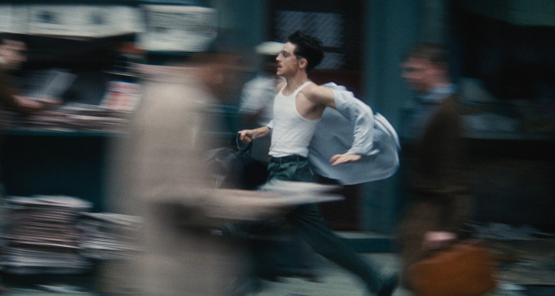 Man running in the streets. A scene from a film. Photo/image `Marty Supreme´ courtesy of A24