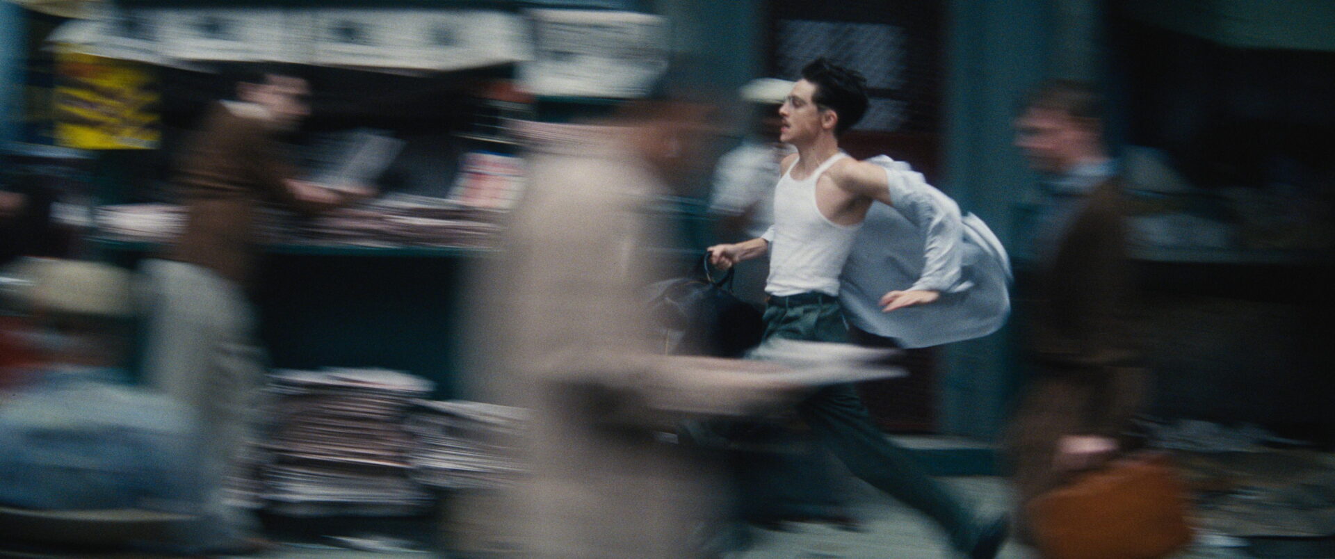Man running in the streets. A scene from a film. Photo/image `Marty Supreme´ courtesy of A24